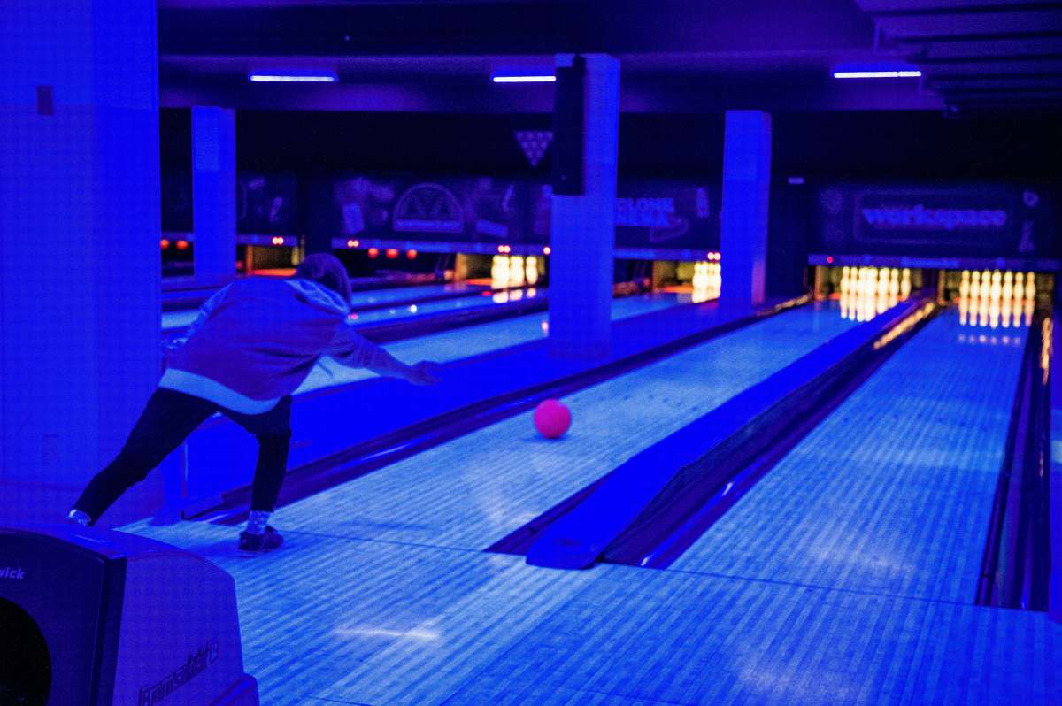 A person bowling at CyBowl